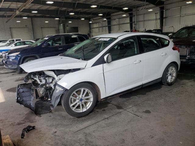 FORD FOCUS SE 2017 with VIN 1FADP3K2XHL299672 - Photo from auction