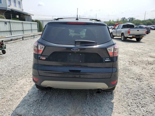 Photo 6 from auction – 2018 FORD ESCAPE SE with VIN 1FMCU9GD9JUD24908