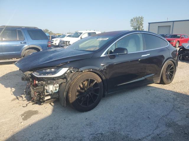 TESLA MODEL X 2017 with VIN 5YJXCBE20HF051054 - Photo from auction