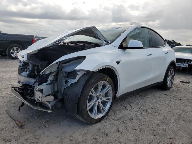 TESLA MODEL Y 2023 with VIN 7SAYGDEE7PA036922 - Photo from auction
