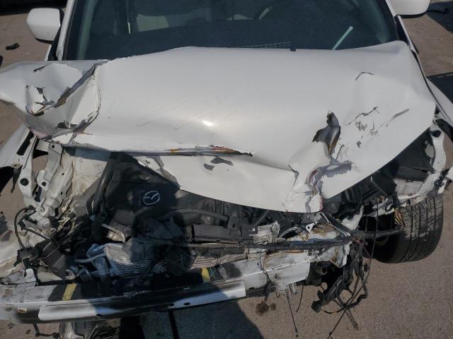 Photo 12 from auction – 2012 MAZDA 5 with VIN JM1CW2BL2C0115072