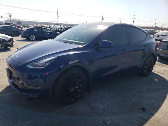 TESLA MODEL Y 2021 with VIN 5YJYGAEE4MF302634 - Photo from auction