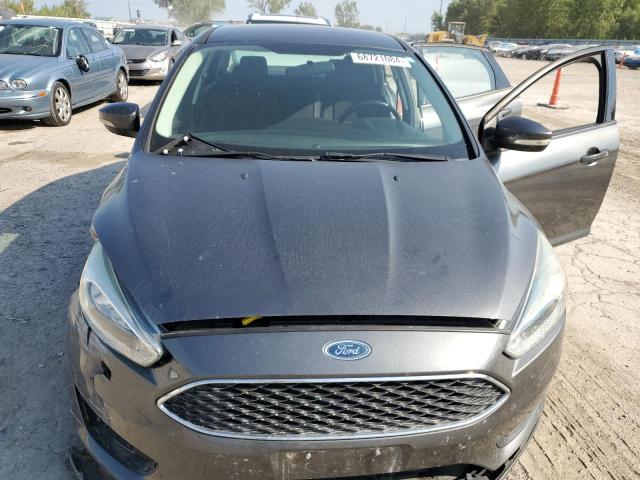 Photo 11 from auction – 2015 FORD FOCUS SE with VIN 1FADP3F21FL253638