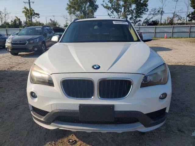Photo 5 from auction – 2015 BMW X1 SDRIVE2 with VIN WBAVM1C53FVW56841