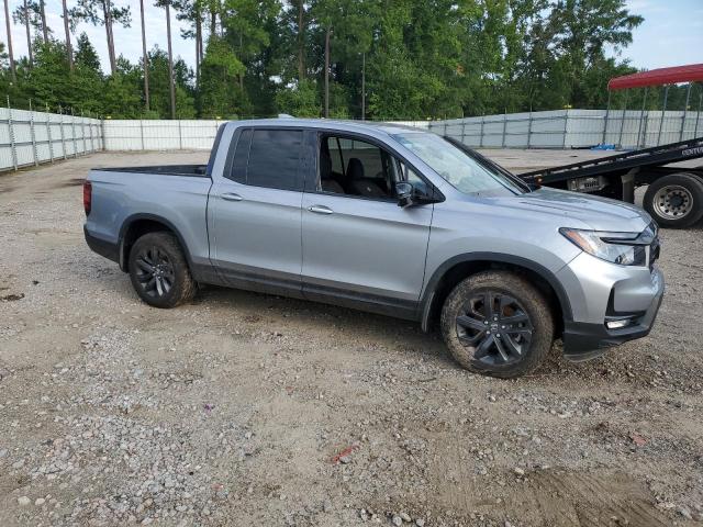 Photo 4 from auction – 2023 HONDA RIDGELINE with VIN 5FPYK3F18PB049352