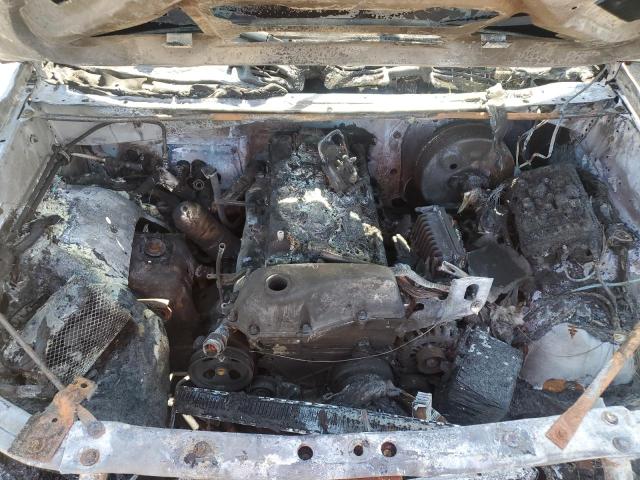 Photo 12 from auction – 2003 CHEVROLET TRAILBLAZE with VIN 1GNES16S736141705