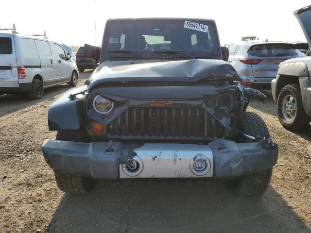 Photo 5 from auction – 2012 JEEP WRANGLER U with VIN 1C4BJWEG4CL269104