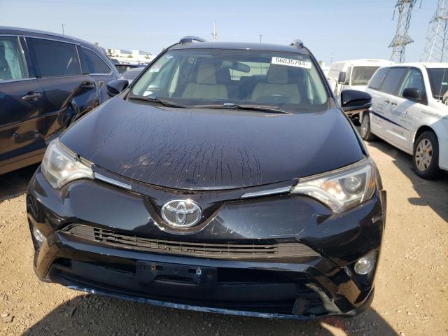 Photo 5 from auction – 2016 TOYOTA RAV4 XLE with VIN 2T3RFREV3GW509651