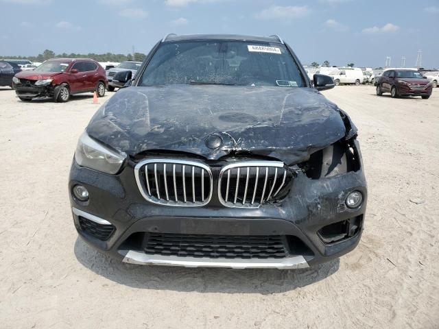 Photo 5 from auction – 2018 BMW X1 XDRIVE2 with VIN WBXHT3C36J5L30251