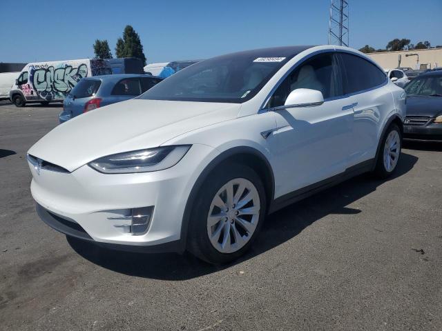 TESLA MODEL X 2018 with VIN 5YJXCAE28JF123117 - Photo from auction