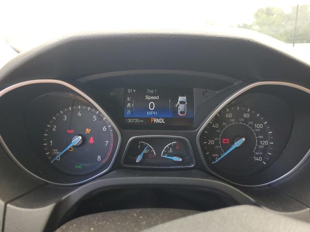 Photo 9 from auction – 2016 FORD FOCUS SE with VIN 1FADP3F21GL371478