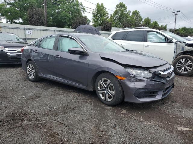 Photo 4 from auction – 2018 HONDA CIVIC LX with VIN 2HGFC2E54JH567487