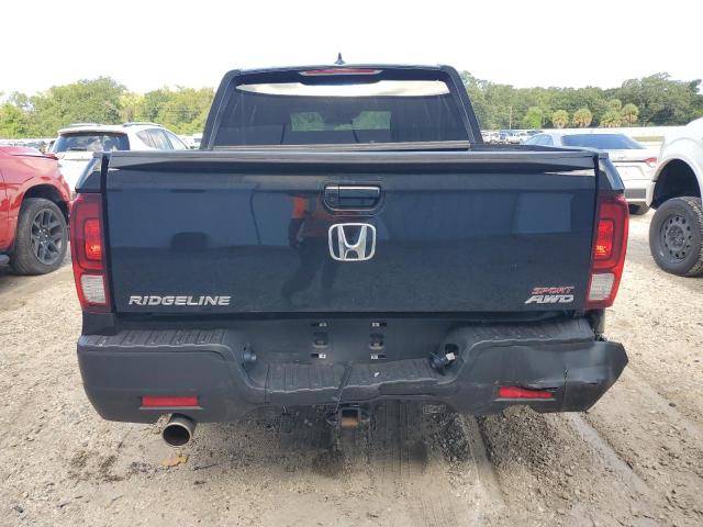 Photo 6 from auction – 2023 HONDA RIDGELINE with VIN 5FPYK3F10PB049216