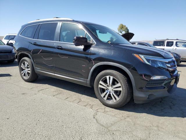 Photo 4 from auction – 2016 HONDA PILOT EXLN with VIN 5FNYF6H76GB006435