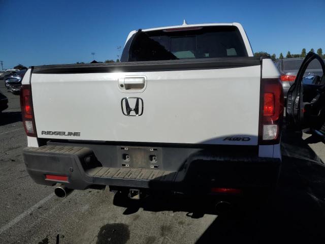 Photo 6 from auction – 2021 HONDA RIDGELINE with VIN 5FPYK3F75MB026093