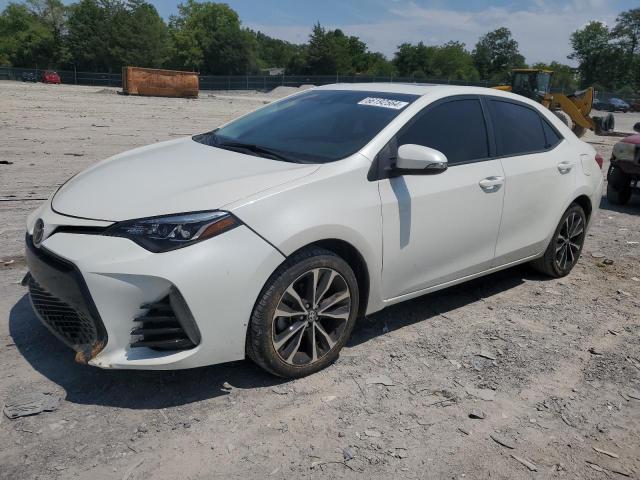 TOYOTA COROLLA L 2018 with VIN 5YFBURHEXJP810244 - Photo from auction