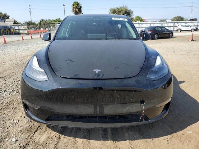 Photo 5 from auction – 2022 TESLA MODEL Y with VIN 7SAYGDEF5NF576570