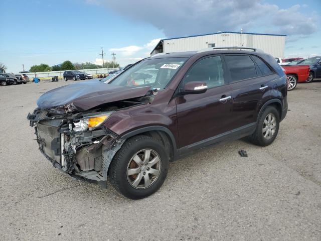 KIA SORENTO LX 2013 with VIN 5XYKT4A22DG390512 - Photo from auction