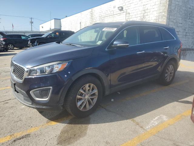 KIA SORENTO LX 2016 with VIN 5XYPG4A57GG043847 - Photo from auction