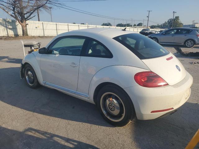 Photo 2 from auction – 2013 VOLKSWAGEN BEETLE with VIN 3VWJP7AT0DM670052