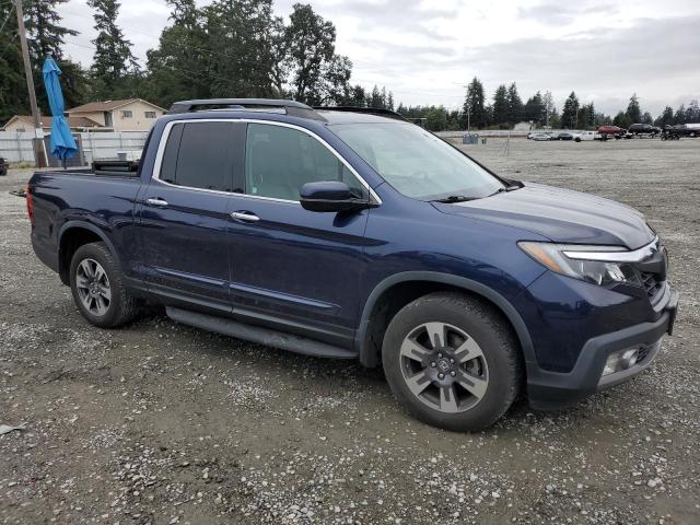 Photo 4 from auction – 2017 HONDA RIDGELINE with VIN 5FPYK3F74HB023997