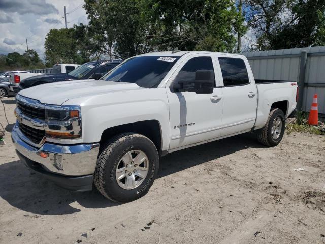 CHEVROLET SILVERADO 2018 with VIN 3GCUKRECXJG360683 - Photo from auction