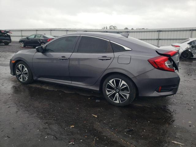 Photo 2 from auction – 2017 HONDA CIVIC EX with VIN 2HGFC1F36HH652946