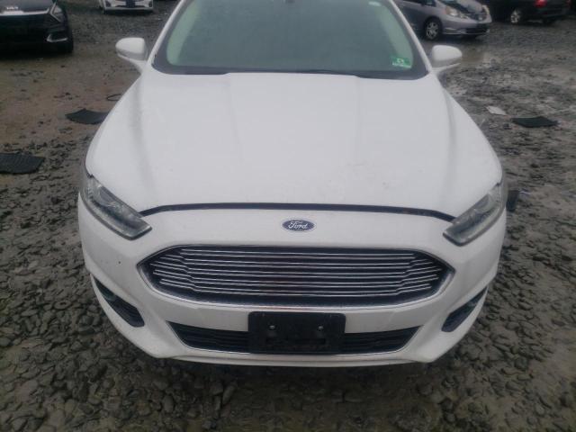 Photo 11 from auction – 2016 FORD FUSION TIT with VIN 3FA6P0K93GR361028