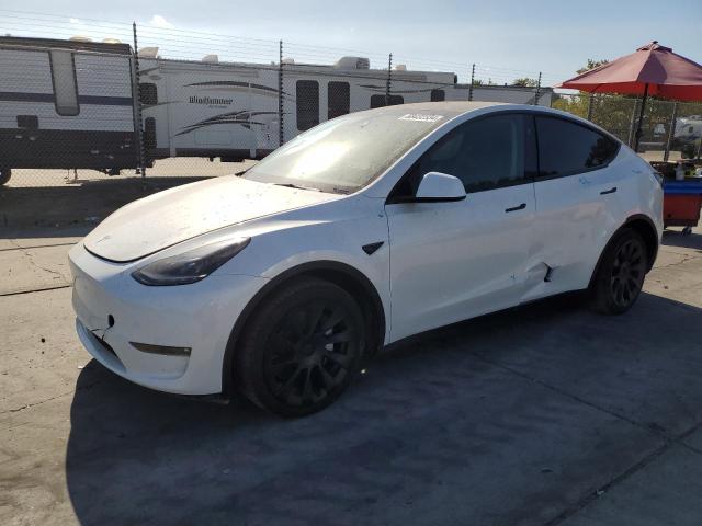 TESLA MODEL Y 2023 with VIN 7SAYGAEE9PF835117 - Photo from auction
