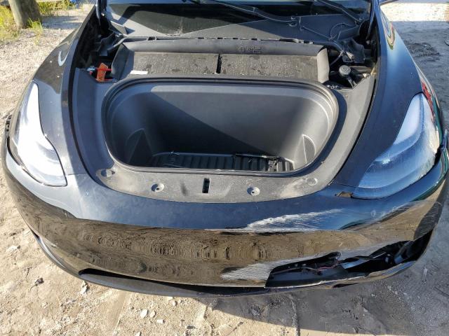 Photo 11 from auction – 2023 TESLA MODEL Y with VIN 7SAYGDEE6PF894725