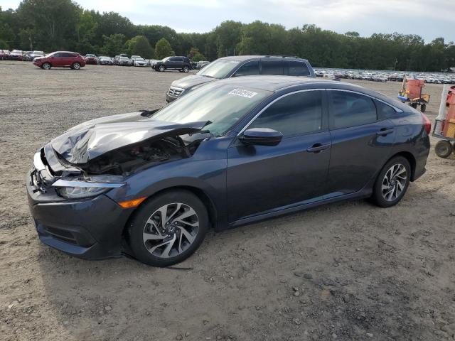 HONDA CIVIC EX 2017 with VIN 19XFC2F72HE034588 - Photo from auction