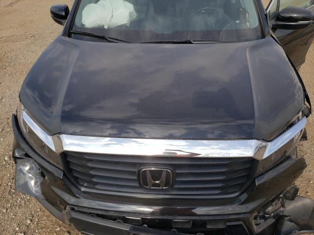 Photo 11 from auction – 2023 HONDA RIDGELINE with VIN 5FPYK3F58PB010196