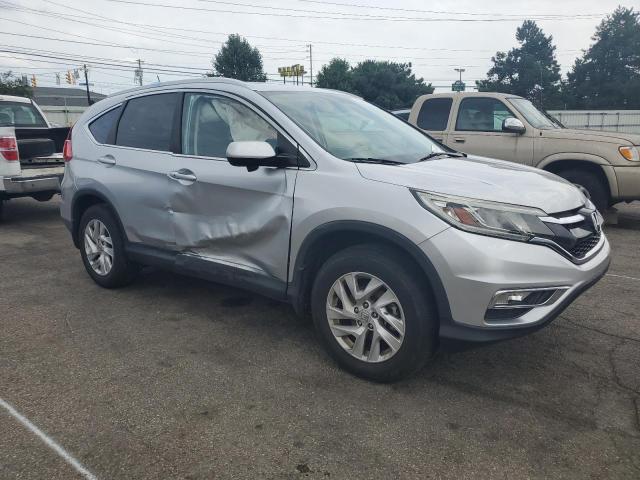 Photo 4 from auction – 2016 HONDA CR-V EXL with VIN 2HKRM4H77GH694395