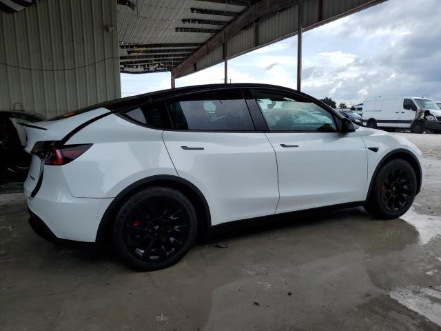 Photo 3 from auction – 2021 TESLA MODEL Y with VIN 5YJYGDEE9MF119666