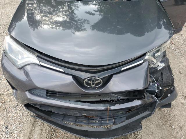 Photo 12 from auction – 2018 TOYOTA RAV4 LE with VIN JTMZFREV9JJ731665