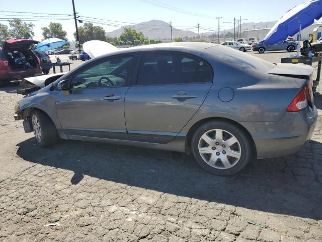 Photo 2 from auction – 2010 HONDA CIVIC LX with VIN 19XFA1F5XAE048579