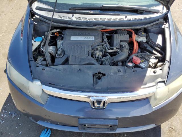 Photo 11 from auction – 2006 HONDA CIVIC HYBR with VIN JHMFA36206S027342