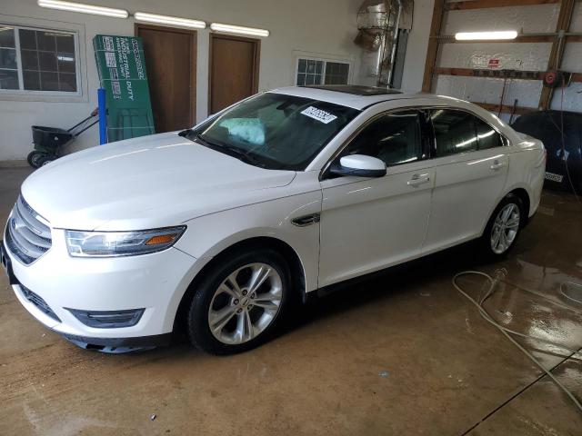 FORD TAURUS SEL 2014 with VIN 1FAHP2E81EG125005 - Photo from auction