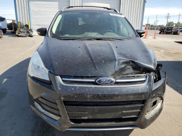 Foto 5 de la subasta – 2014 FORD ESCAPE TIT con VIN 1FMCU9JX2EUD12883