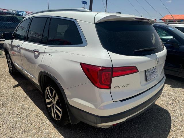 Photo 3 from auction – 2017 HONDA PILOT TOUR with VIN 5FNYF5H94HB025126