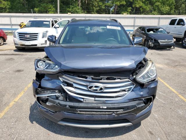 Photo 5 from auction – 2018 HYUNDAI SANTA FE S with VIN 5NMZU3LB3JH079014