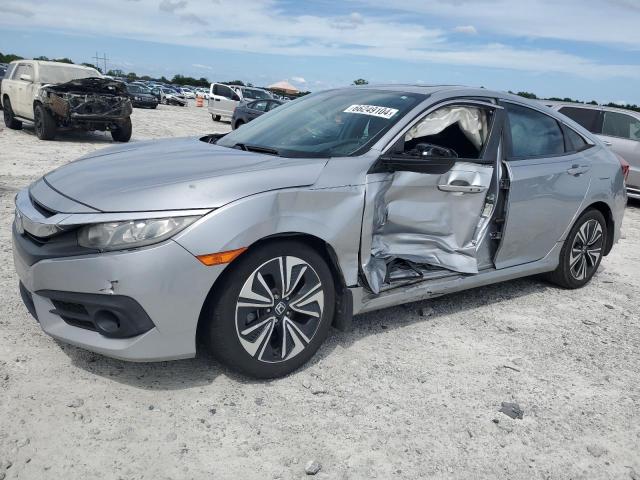 HONDA CIVIC EX 2017 with VIN 19XFC1F31HE026621 - Photo from auction