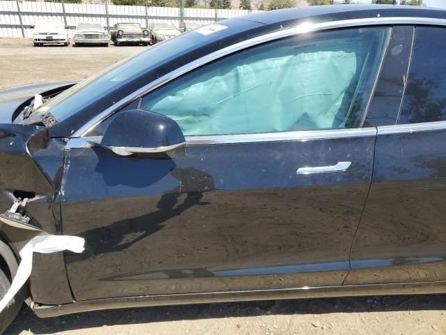 Photo 7 from auction – 2019 TESLA MODEL 3 with VIN 5YJ3E1EA2KF397656