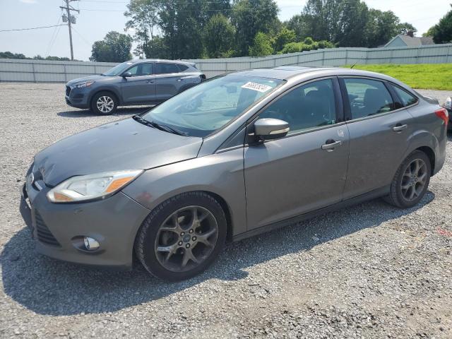 FORD FOCUS SE 2013 with VIN 1FADP3F22DL168840 - Photo from auction