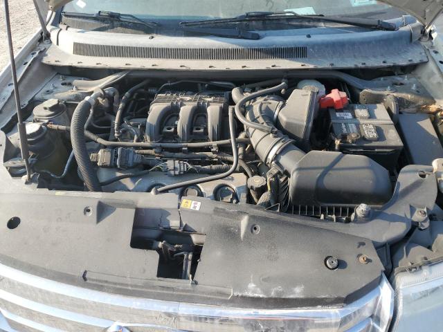 Photo 12 from auction – 2008 FORD TAURUS X L with VIN 1FMDK06W18GA25902