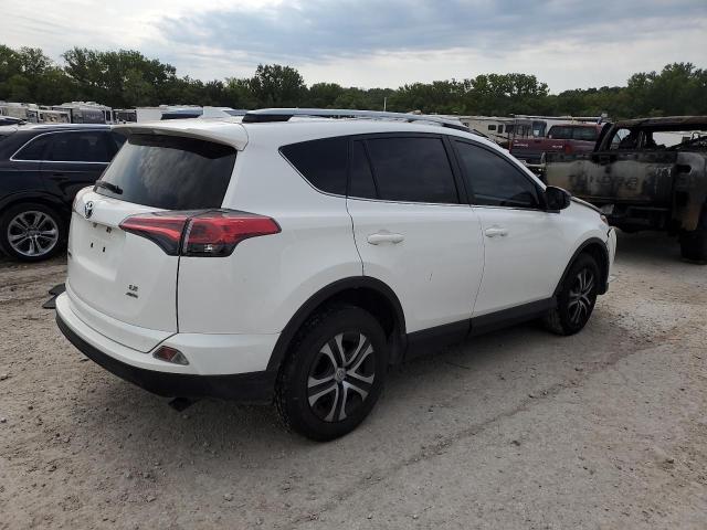 Photo 3 from auction – 2017 TOYOTA RAV4 LE with VIN JTMBFREVXHJ148906