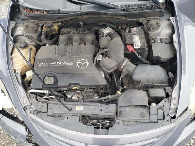 Photo 11 from auction – 2009 MAZDA 6 S with VIN 1YVHP82B495M10225