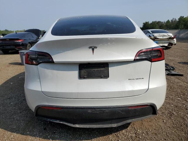 Photo 6 from auction – 2023 TESLA MODEL Y with VIN 7SAYGDEE4PF603140