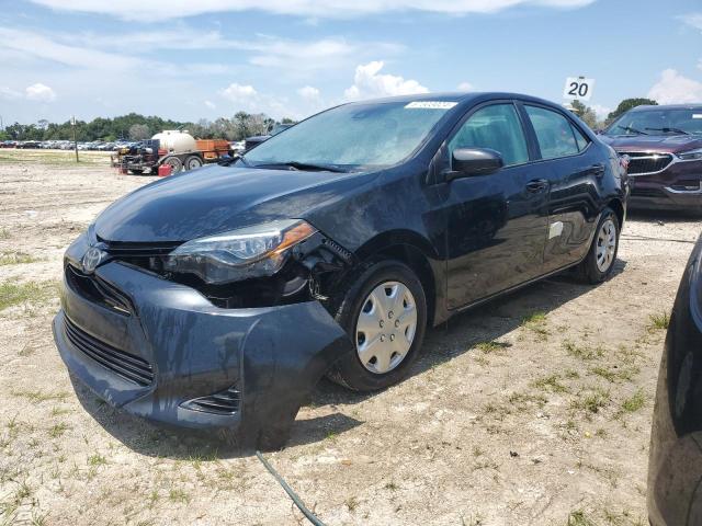 TOYOTA COROLLA L 2018 with VIN 5YFBURHE8JP765692 - Photo from auction