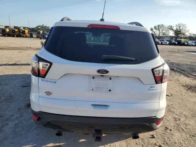 Photo 6 from auction – 2017 FORD ESCAPE SE with VIN 1FMCU0G90HUE64850